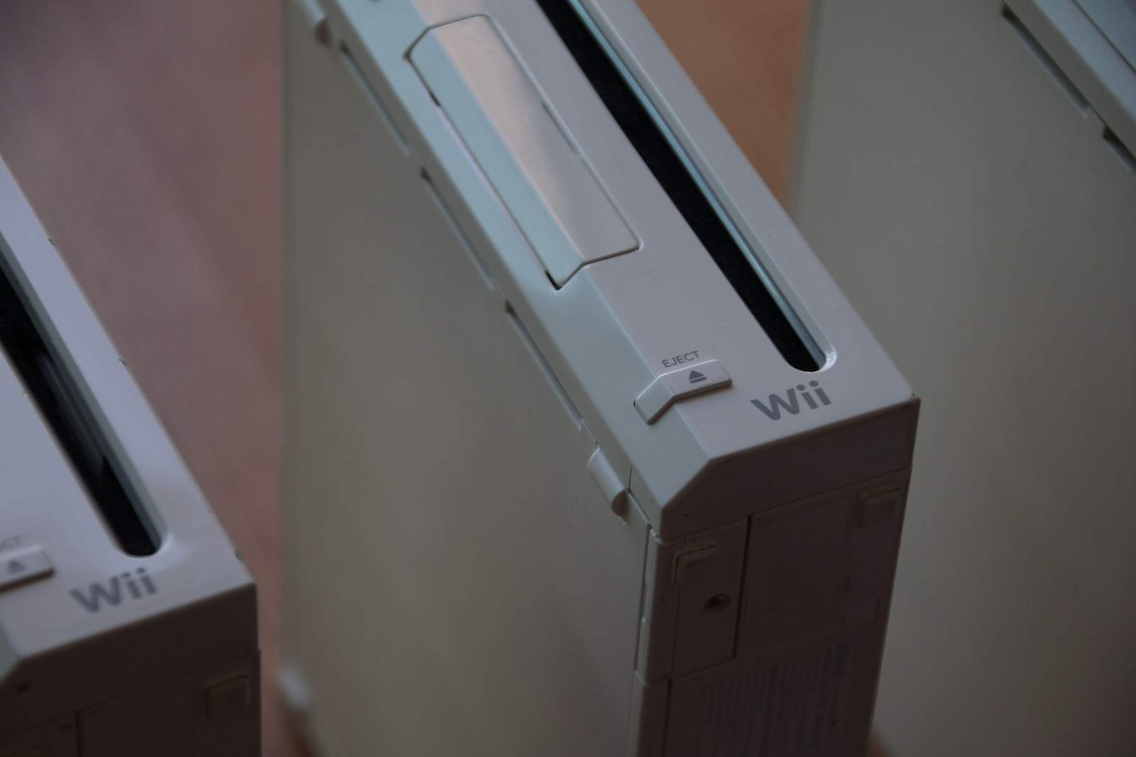 two nintendo wii game consoles side by side