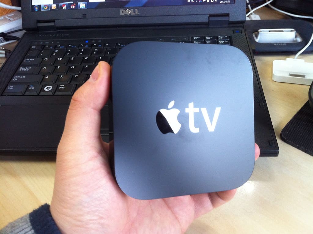 Apple TV Device In Hand