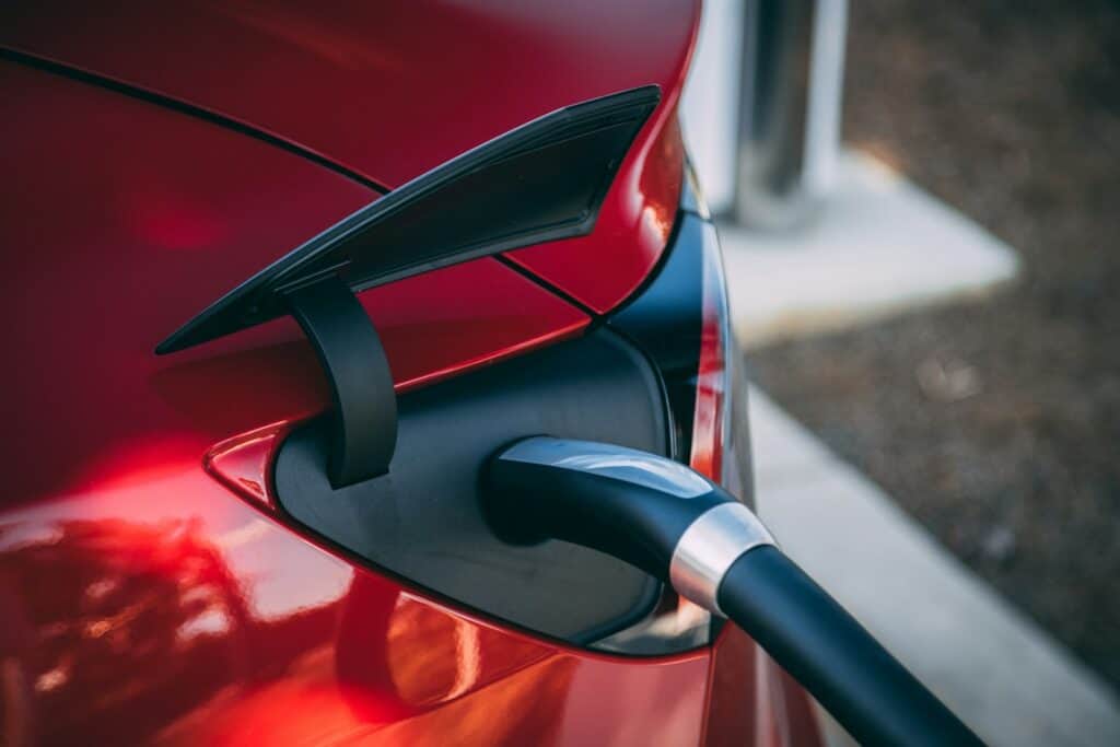 How Much It Costs to Charge a Tesla (2025 Guide) 3 close-up photography of red car