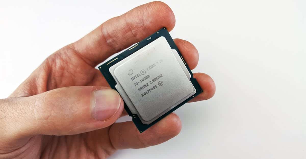 person holding an intel processor