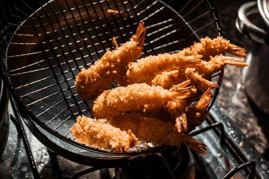 a group of shrimp on a grill