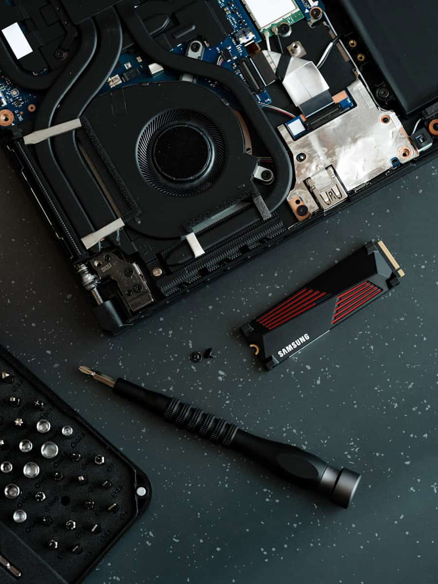 A laptop with a broken keyboard and a broken camera