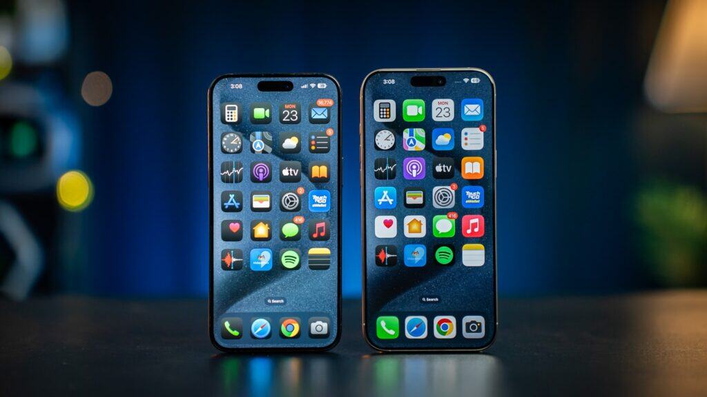 iOS 18.6 and iPadOS 18.6 Now Released: Updates, Fixes, and Key Changes 2 Two cell phones sitting next to each other on a table