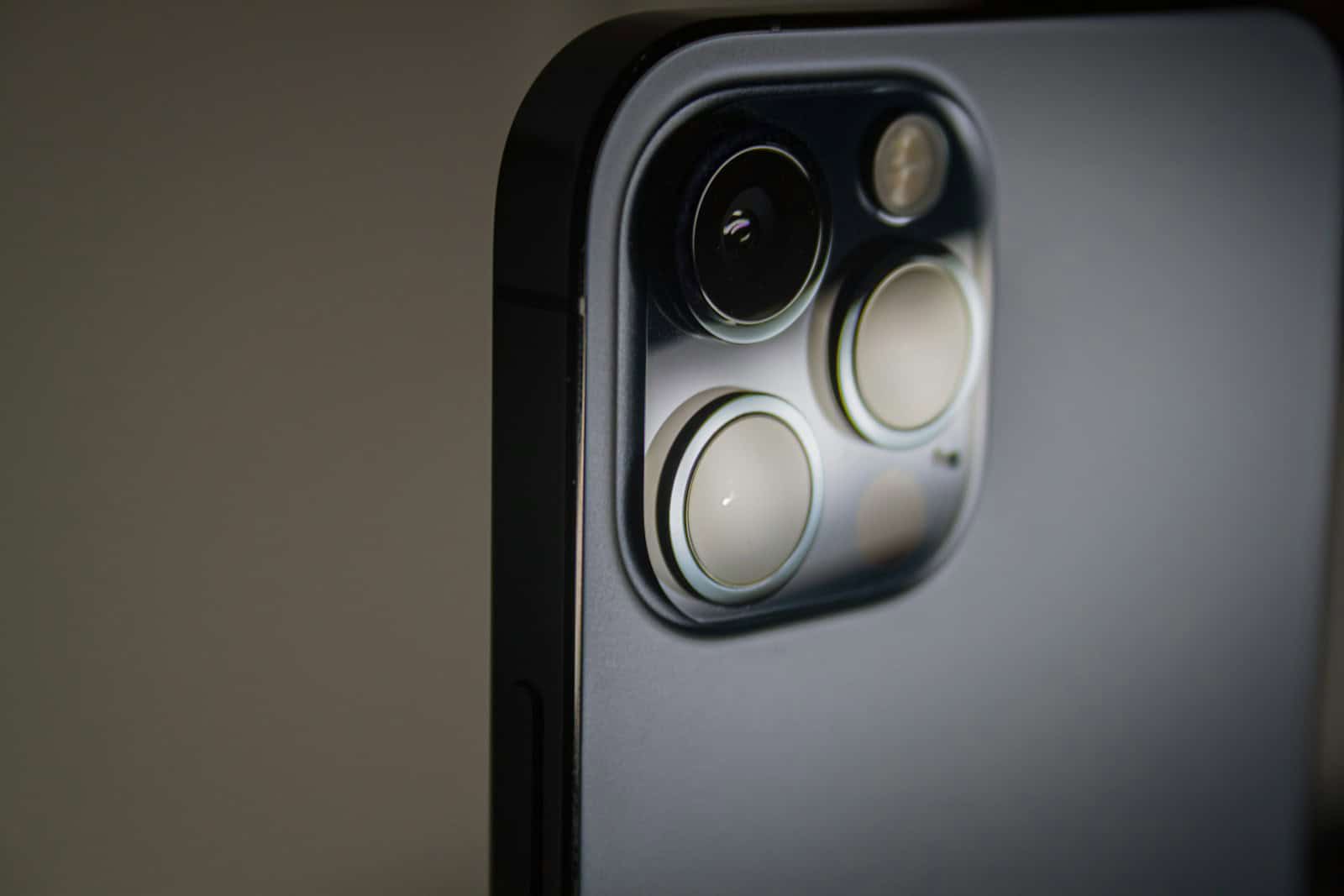 black and gray speaker on white table