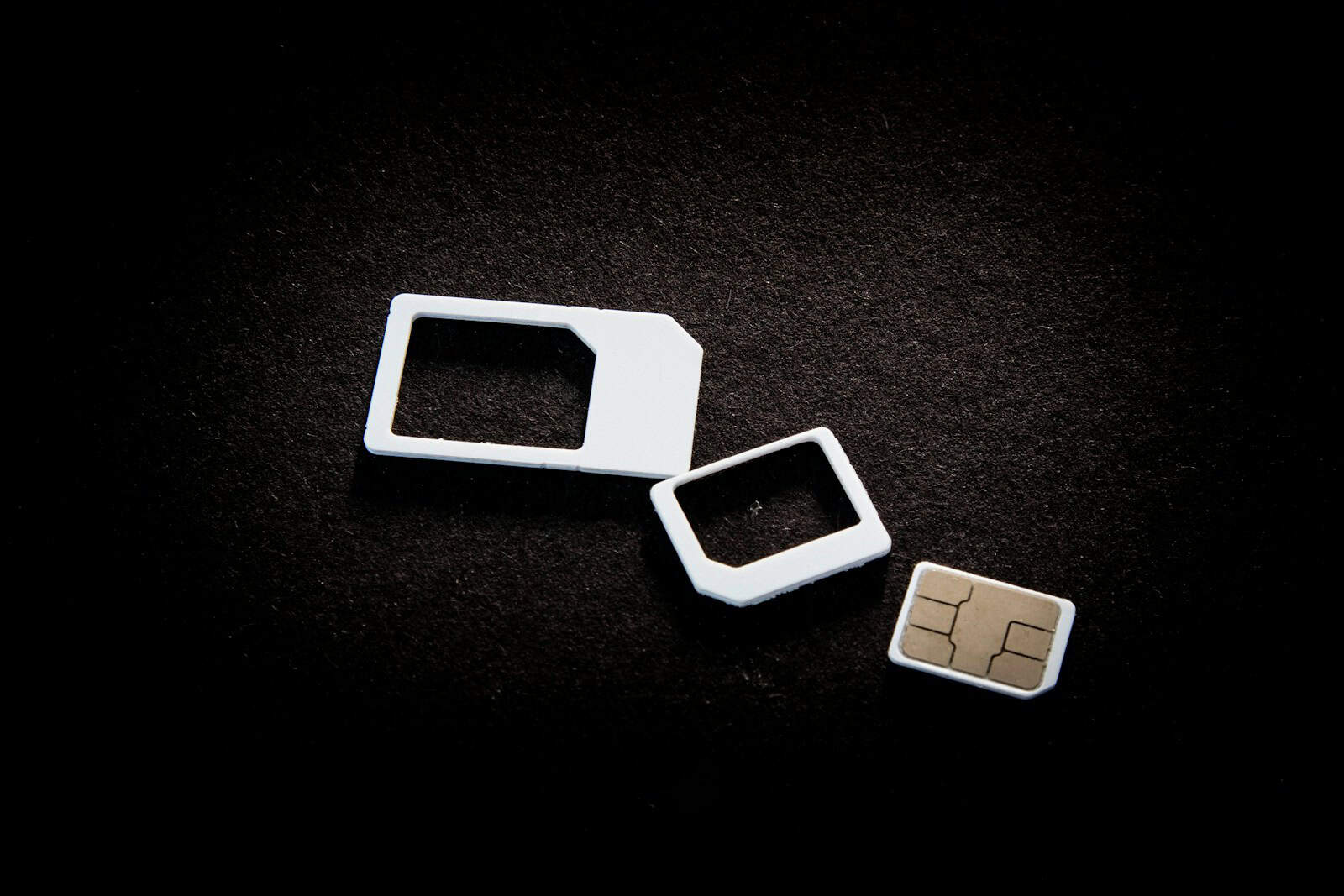 Sim cards and their adaptors are on display.